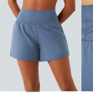 HALARA Blue Athletic Shorts with High-Rise Waistband and Loose Leg Openings